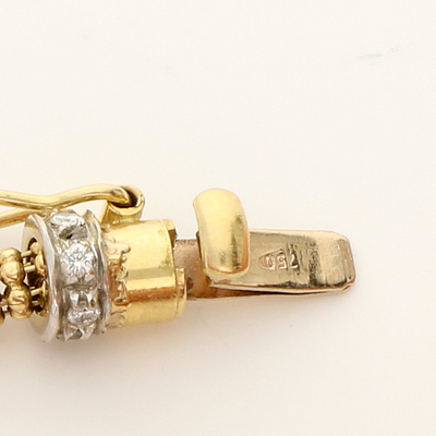 Prabangi 18 karatų geltono aukso apyrankė su išskirtiniu pynimu ir deimantais (PARDUOTAS) — Deimora papuošalai